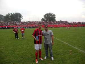 Hasani with his award for best player
