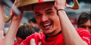 Elmin Rastoder celebrates with Thun's trophy